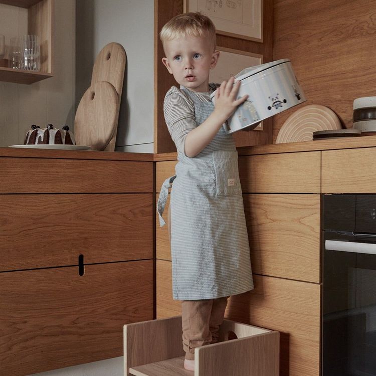 Cooking as a family can establish healthy habits and (eventually) make your life easier with these tips on how to get kids involved in the kitchen from Montessori experts.