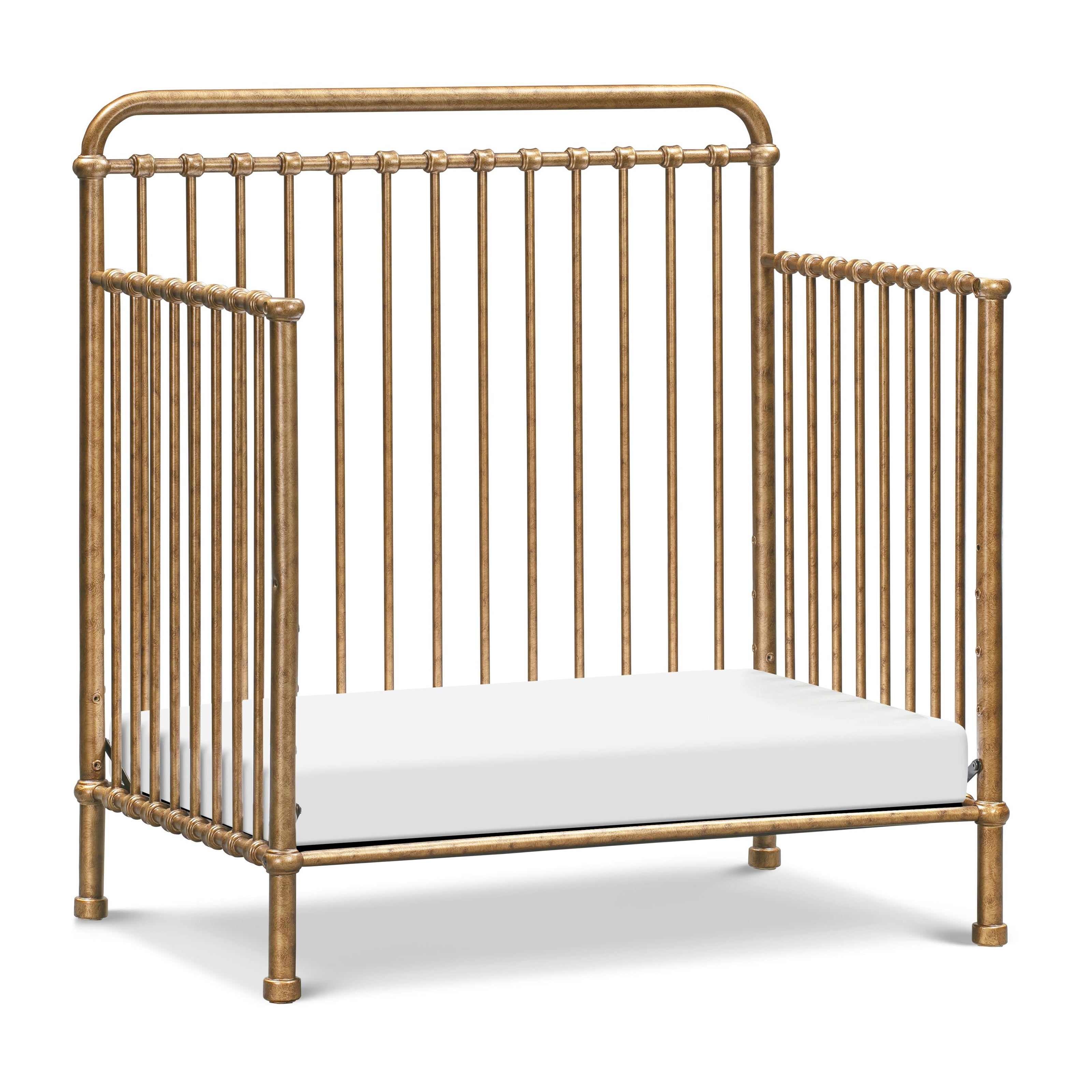 Winston 4-In-1 Convertible Mini Crib in Vintage Gold