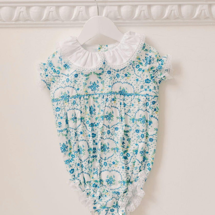 Nicky Hilton x La Coqueta Blue Bow Floral Lily-Grace Baby Girl Romper