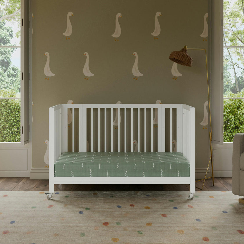 Rolli 9-in-1 Convertible All-Stages® Crib with Bassinet & Toddler Bed Conversion Kits in White