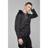 White quarter zip packable rain jacket and windbreaker