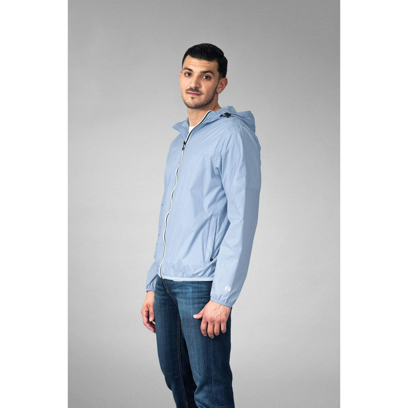Powder blue full zip packable rain jacket and windbreaker
