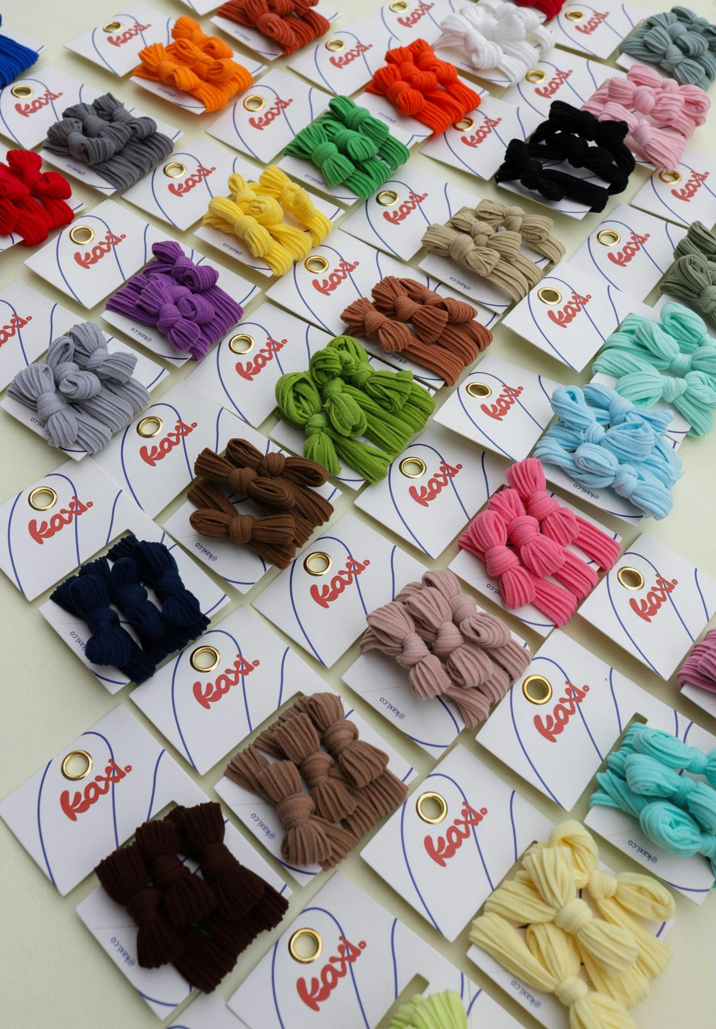 BOW SLICK BACK PONYTAILS (PACK OF 3)