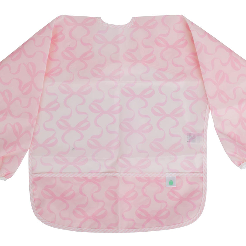 The Cover Everything Bib in Bows on Pink