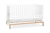 Nursery Works Luma Crib in Acrylic and Rose Gold