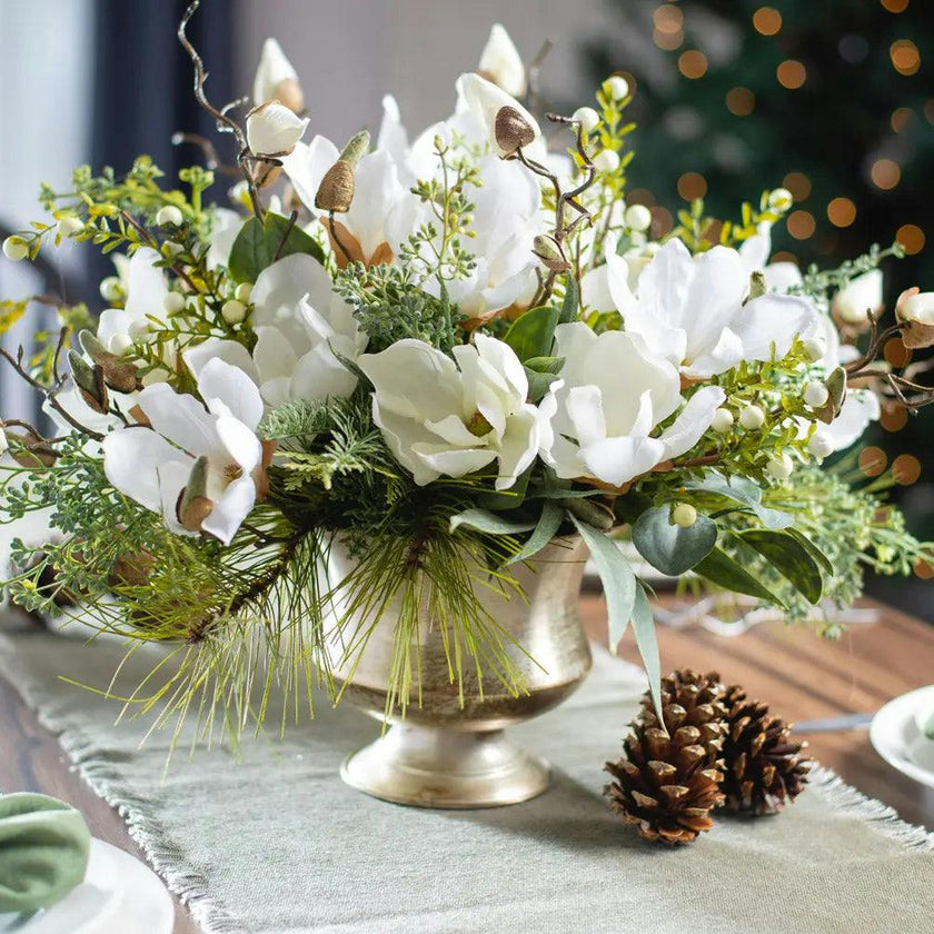 Winter White Magnolia, Pine & Snowberry Christmas Arrangement Centerpiece in Antiqued Silver Metal Urn