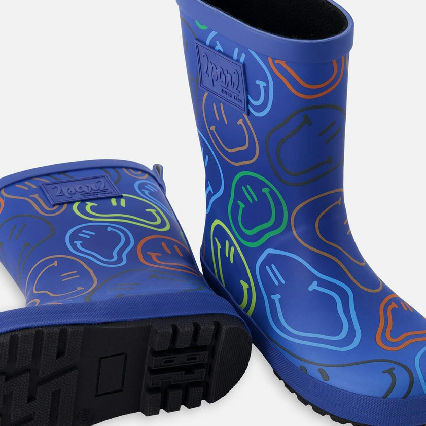 Rain Boots In Natural Rubber Blue Smiley Print
