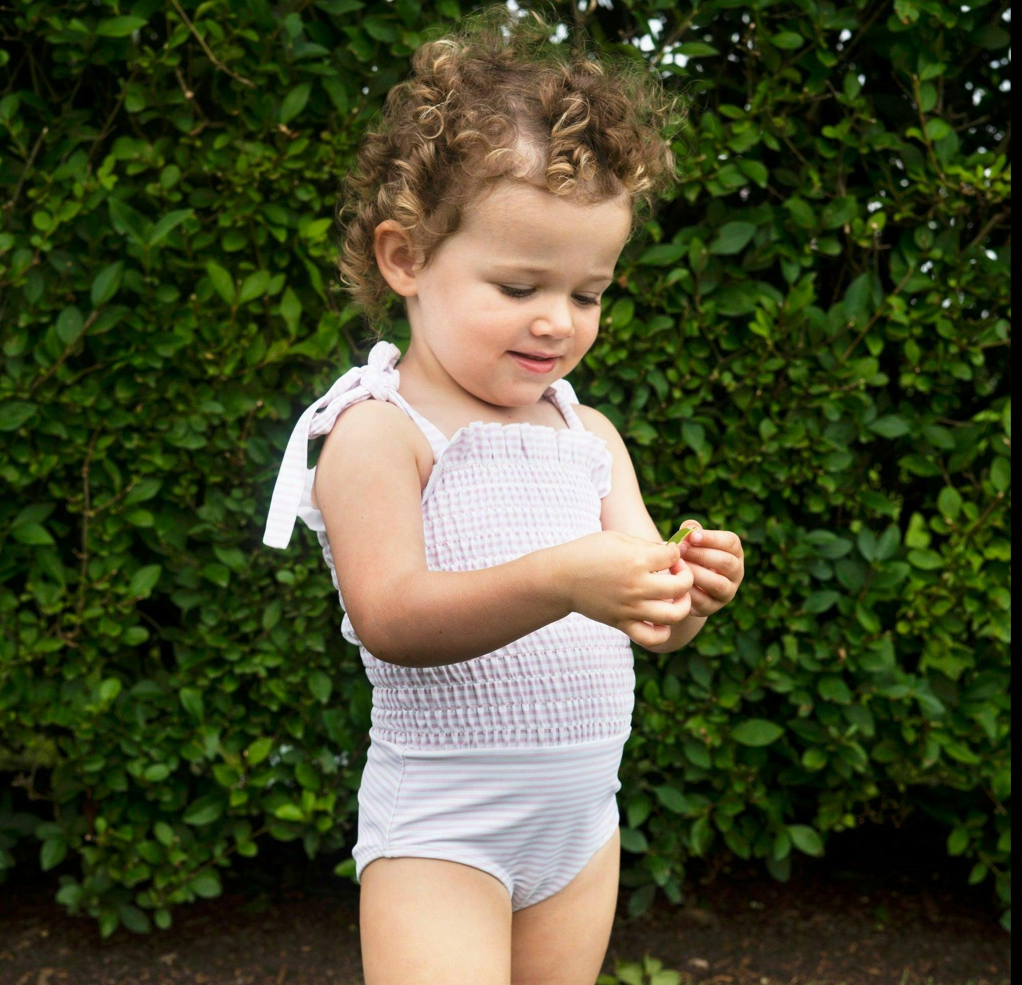 girls pink stripe tie smocked one piece
