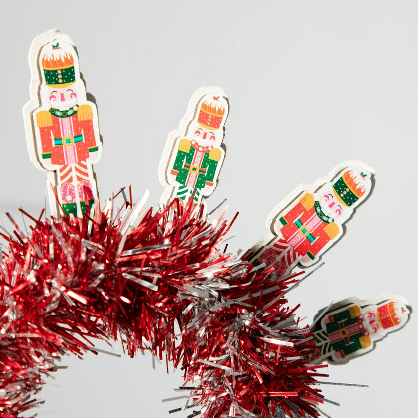 Packed Party Nutcracker Novelty Holiday Headband - Red Tinsel Headband with Mini Nutcrackers for Christmas Parties and Holiday Celebrations, One Size Fits All