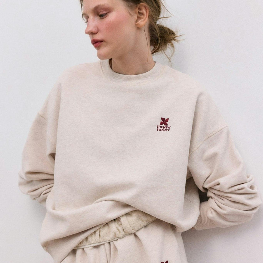 TNS Logo Woman Jogging  Sand Vigore