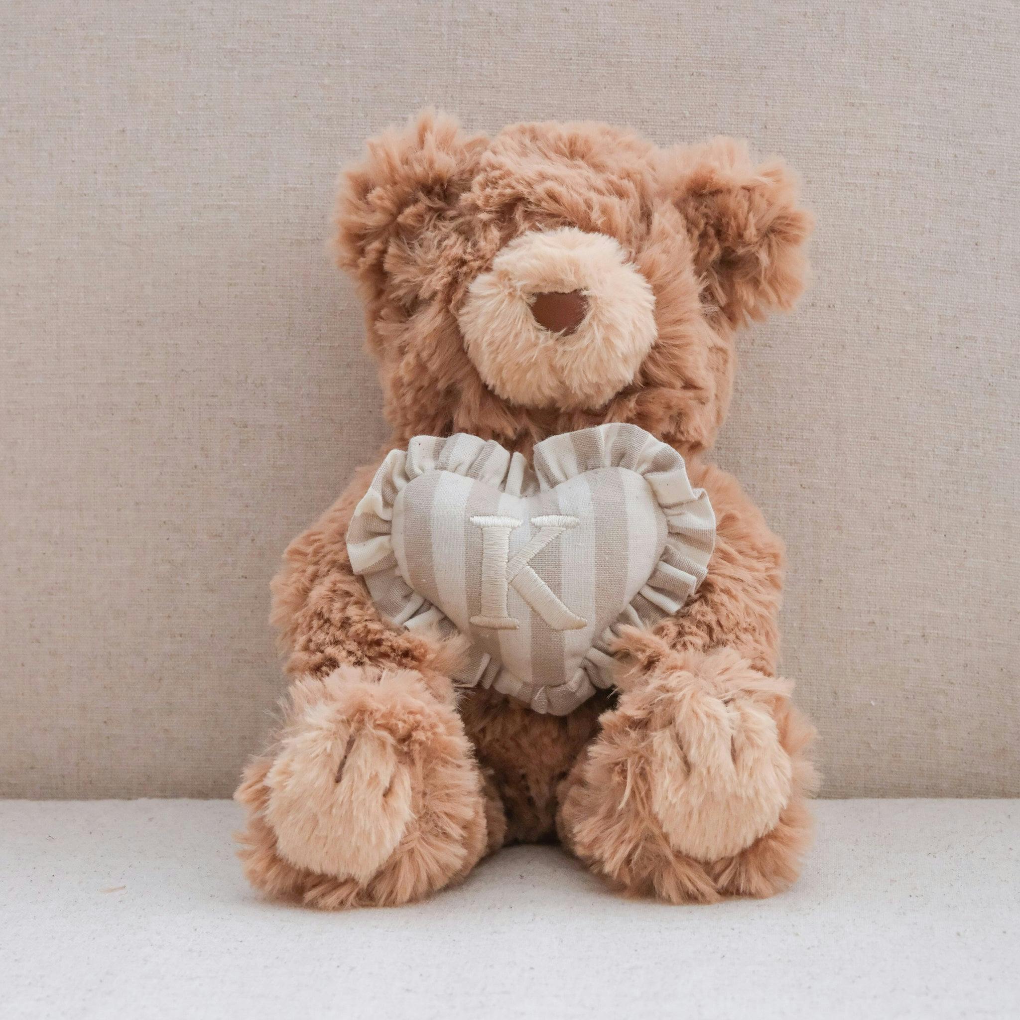 INITIAL TEDDY