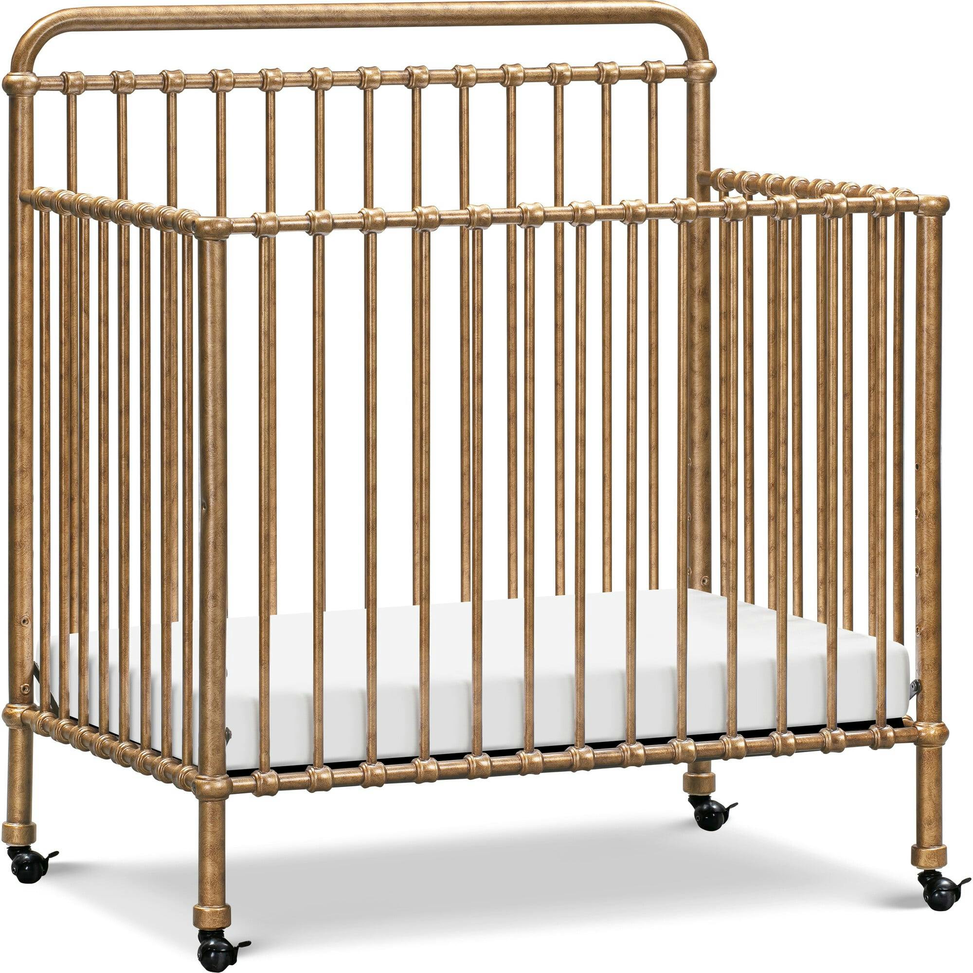 Winston 4-In-1 Convertible Mini Crib in Vintage Gold