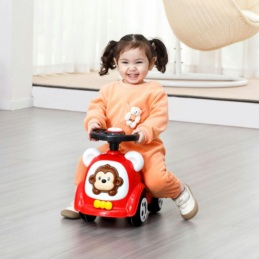 Trimate Red Foot to Floor Ride-on Car W/ Music