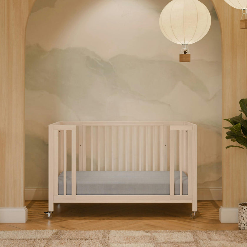 Rolli 9-in-1 Convertible All-Stages® Crib with Bassinet & Toddler Bed Conversion Kits in Washed Natural
