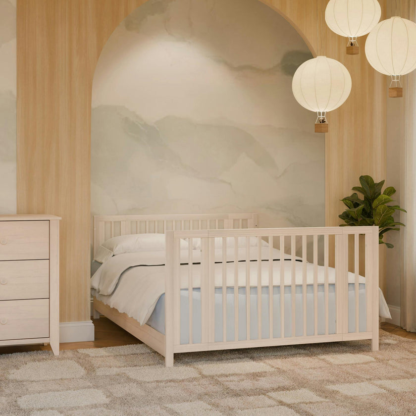 Rolli 9-in-1 Convertible All-Stages® Crib with Bassinet & Toddler Bed Conversion Kits in Washed Natural