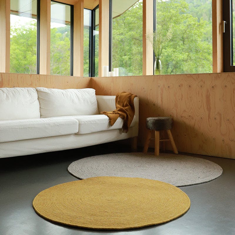 Neethu Hand-Crafted Felted Wool Round Rug, Yellow