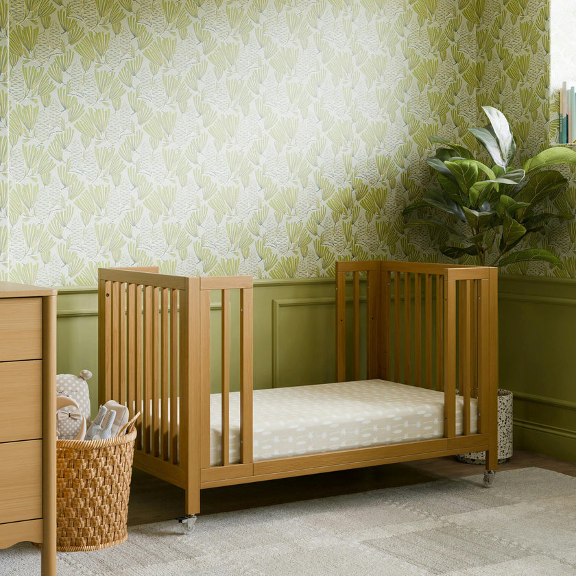 Rolli 9-in-1 Convertible All-Stages® Crib with Bassinet & Toddler Bed Conversion Kits in Honey