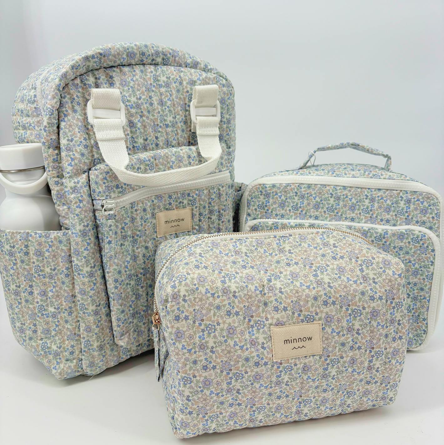 slate floral interior coated travel pouch
