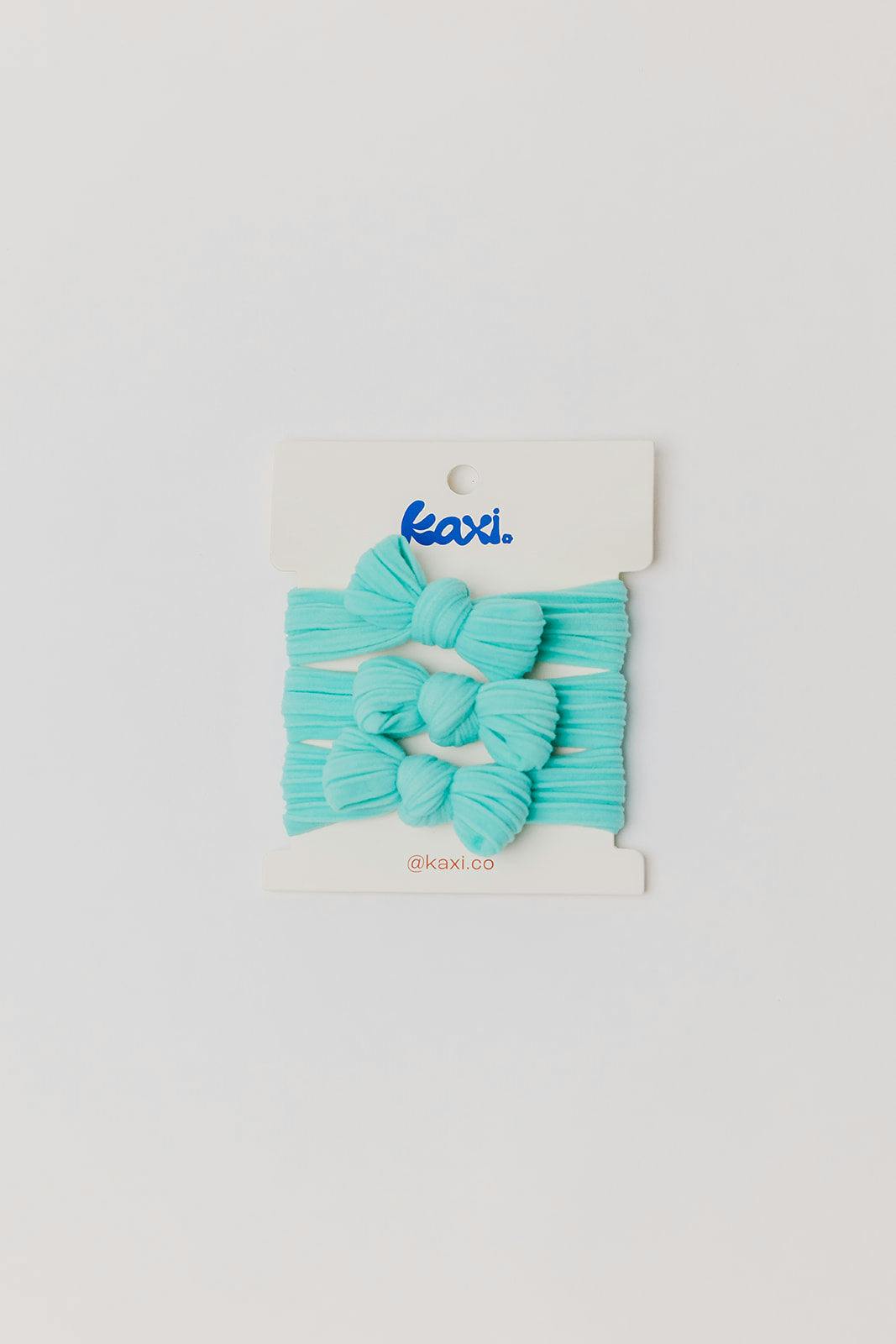 BOW SLICK BACK PONYTAILS (PACK OF 3)
