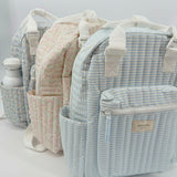 powder blue stripe coated everyday backpack
