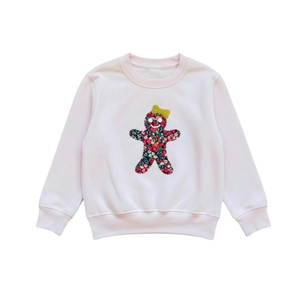Liberty of London children's gingerbread design pale pink jumper