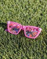 Packed Party Vitamin Me Confetti Novelty Sunglasses - Pink Checkered Frames with 3D Silicone Flowers and Multicolor Confetti Lenses, 2x6 Inch, One Size