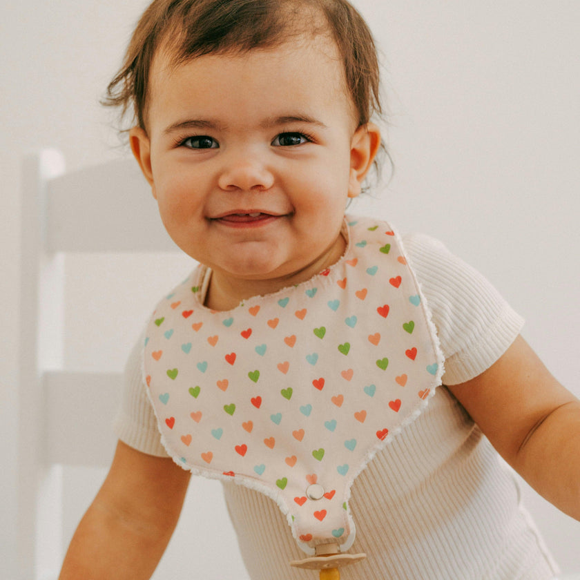 Soothe & Snap Pacifier Bib | Sweetheart Parade