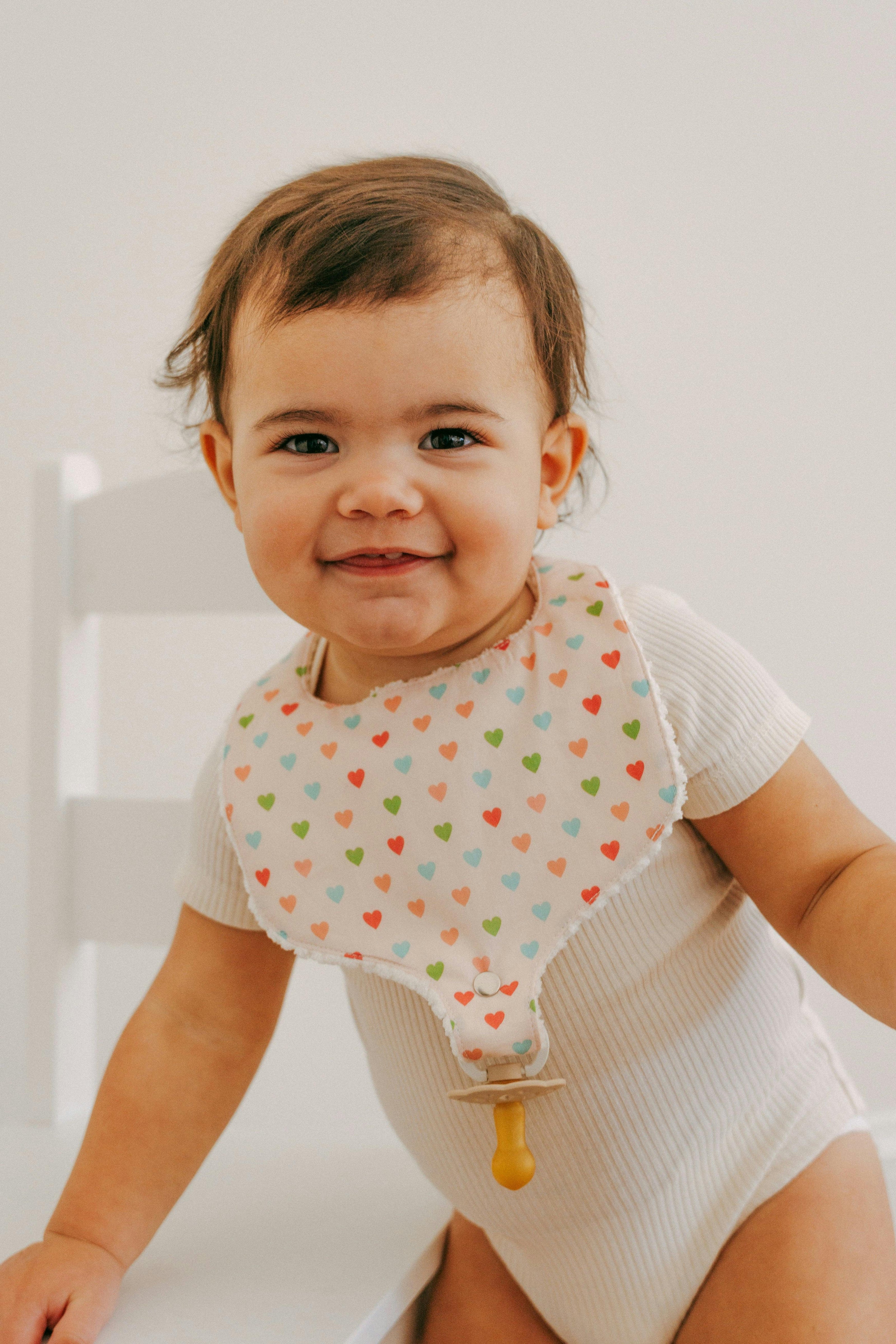 Soothe & Snap Pacifier Bib | Sweetheart Parade