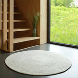 Neethu Hand-Crafted Felted Wool Round Rug, Natural