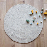 Neethu Hand-Crafted Felted Wool Round Rug, Natural