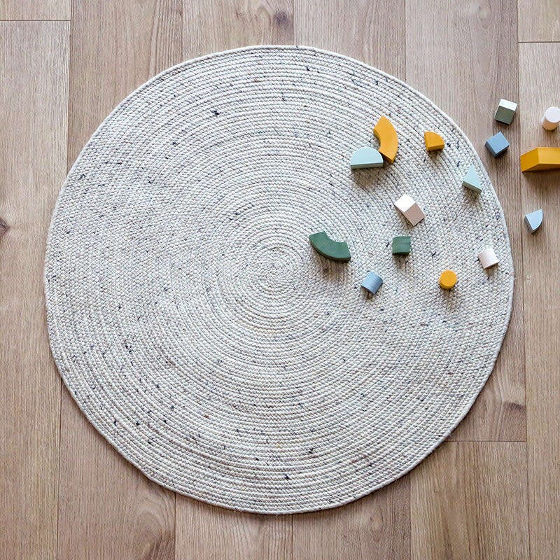 Neethu Hand-Crafted Felted Wool Round Rug, Natural