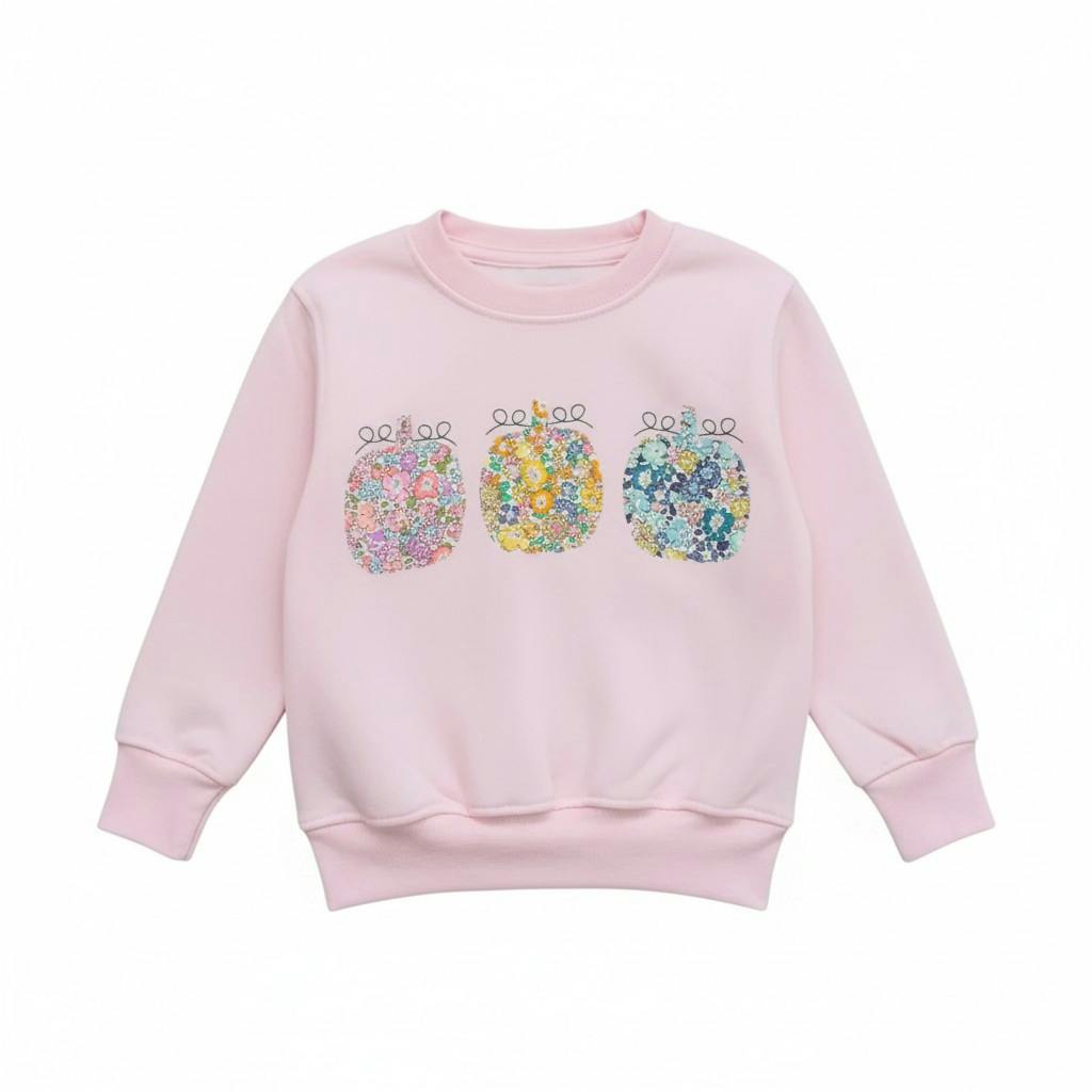 Liberty of London children's pumpkins design pale pink jumper
