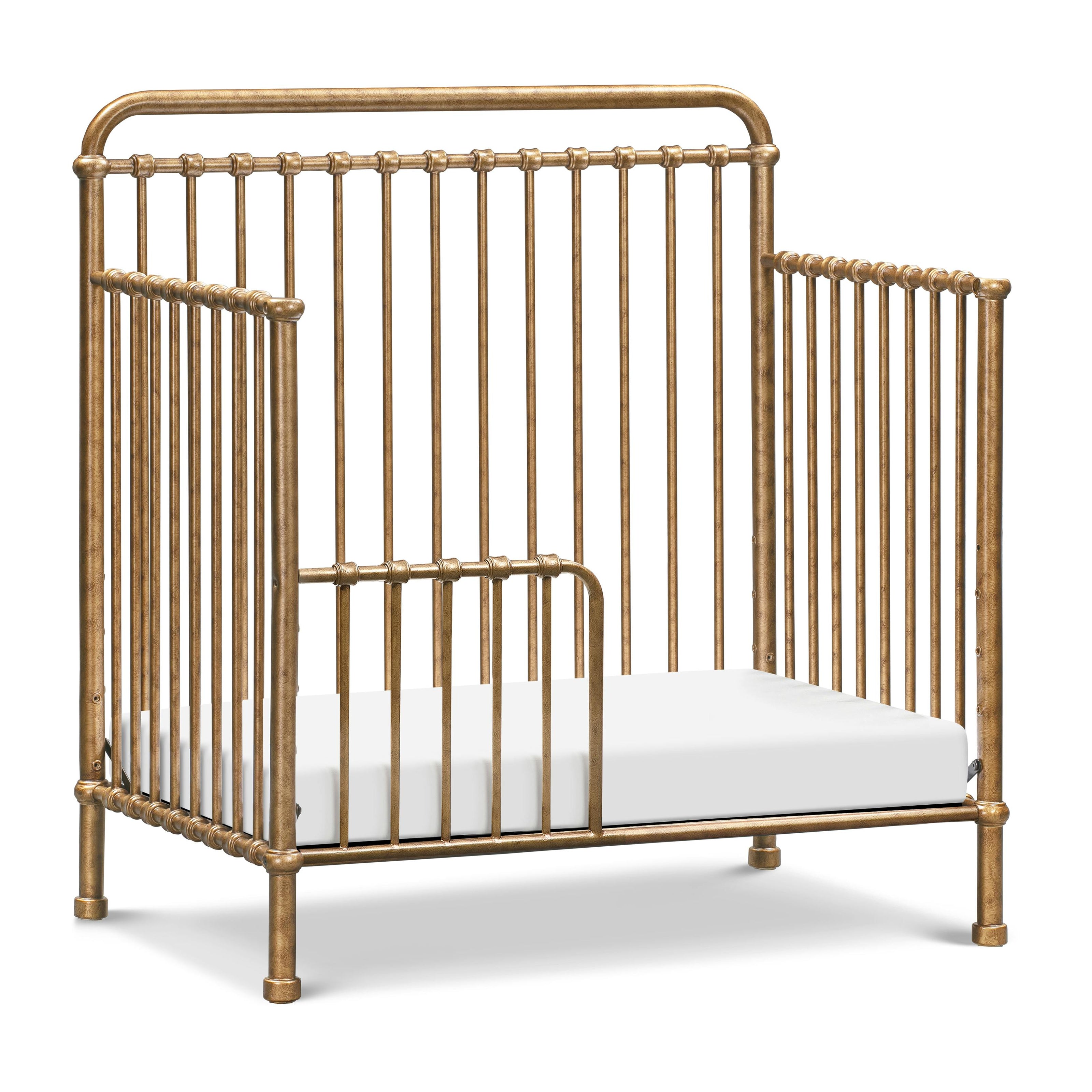 Winston 4-In-1 Convertible Mini Crib in Vintage Gold