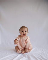 Cory Pocket Romper in Peach Powder