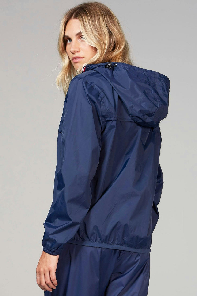 Navy women's quarter zip packable rain jacket and windbreaker