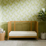 Rolli 9-in-1 Convertible All-Stages® Crib with Bassinet & Toddler Bed Conversion Kits in Honey