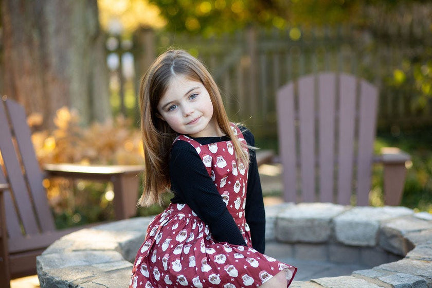 Holiday Pinafore Dress in Christmas Santas