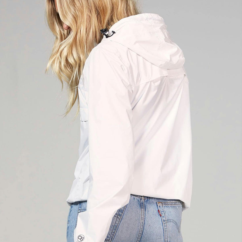 White quarter zip packable rain jacket and windbreaker