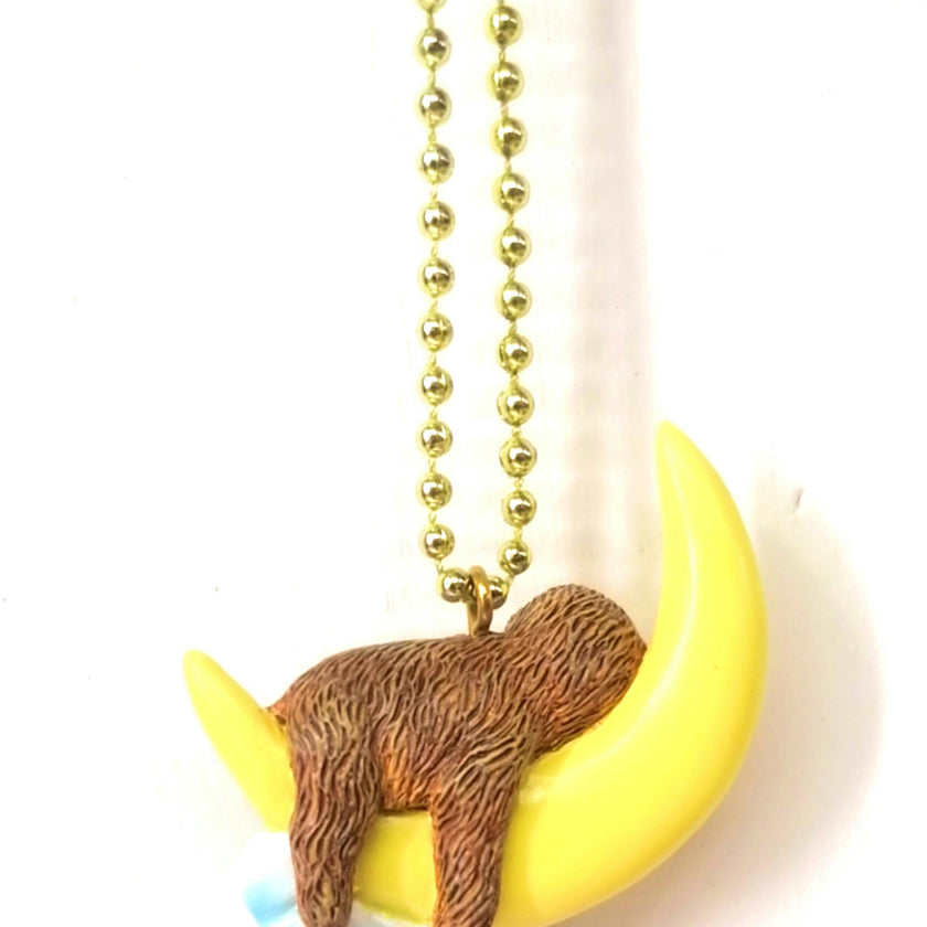 GLOW-IN-THE-DARK SLEEPY SLOTH NECKLACE