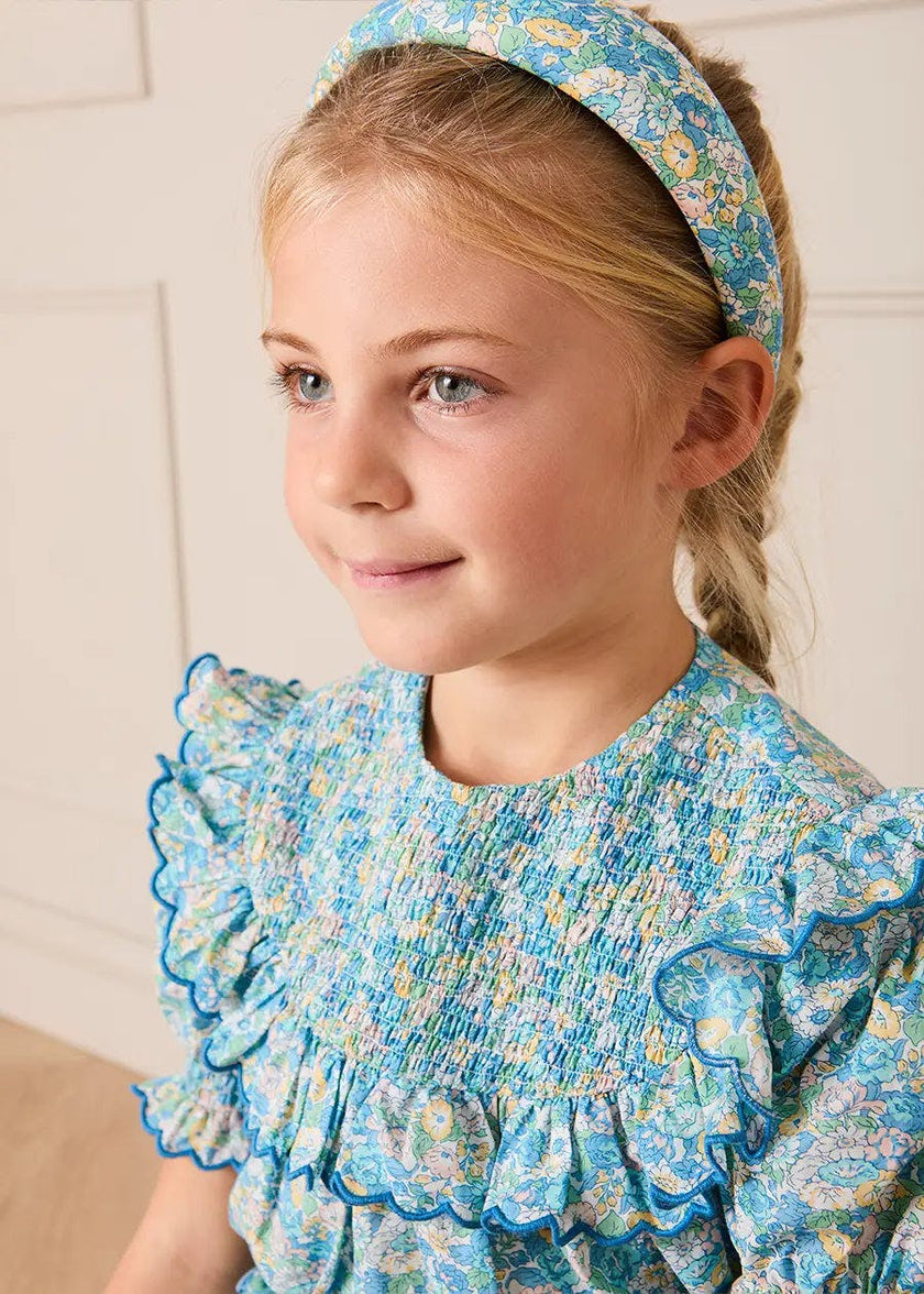 Leontyne Floral Scalloped Smocked Detail Short Sleeve Blouse in Blue Made with Liberty Fabric (2- 10yrs)