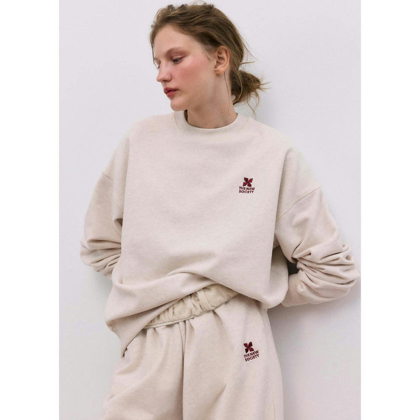 TNS Logo Woman Jogging  Sand Vigore