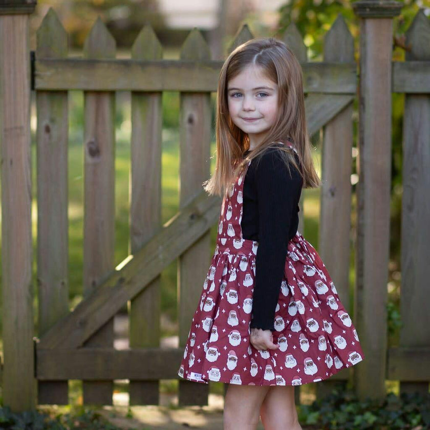 Holiday Pinafore Dress in Christmas Santas