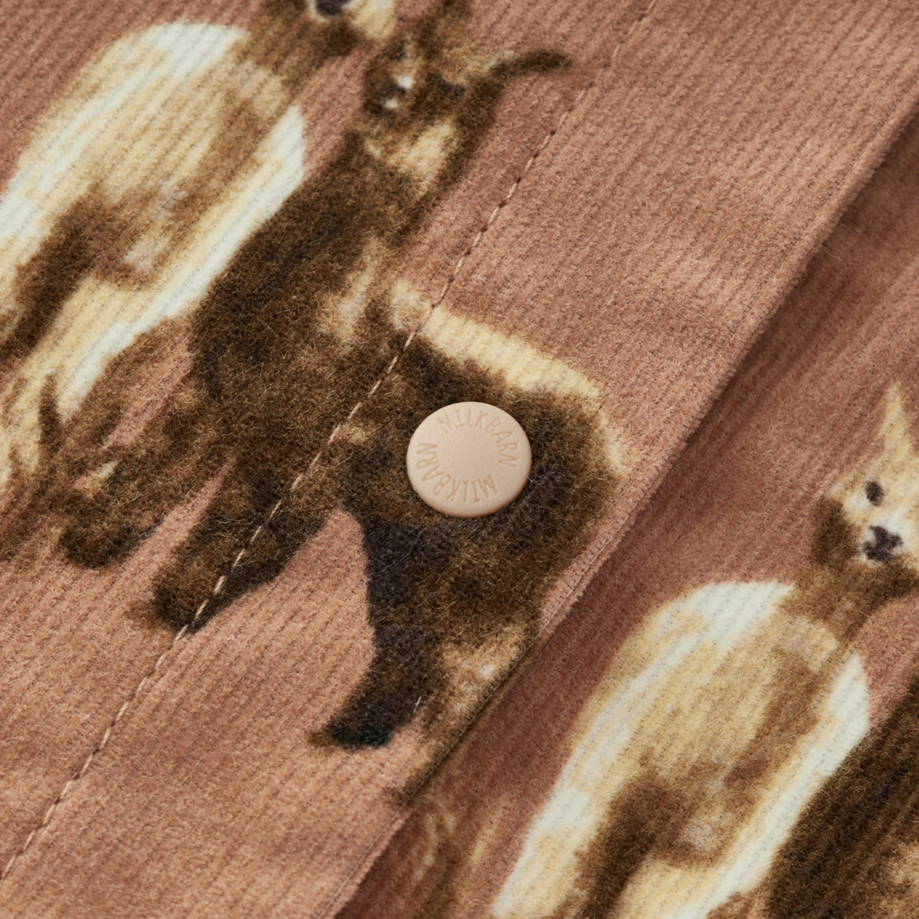 Corduroy Ruffle Snap Jumper
