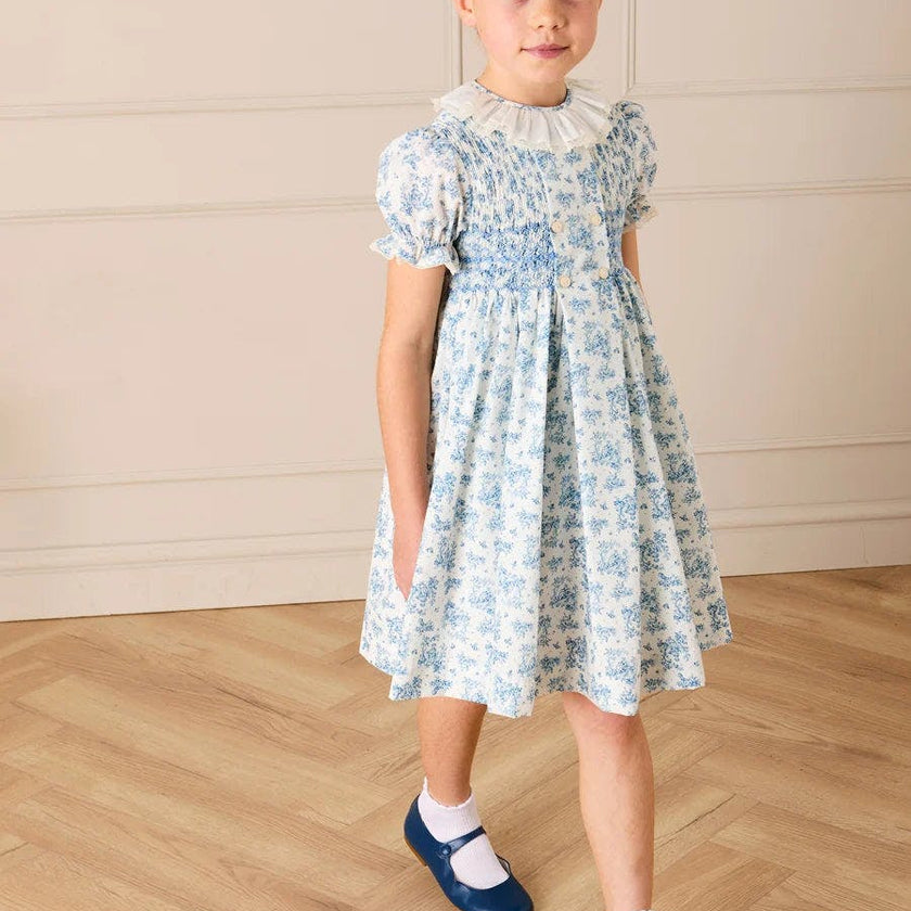 Audrey Toile Hand Smocked Ruffle Collar Short Sleeve Dress in Blue (12mths- 10yrs)