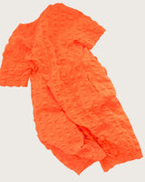 Dorian Orange seersucker jumpsuit