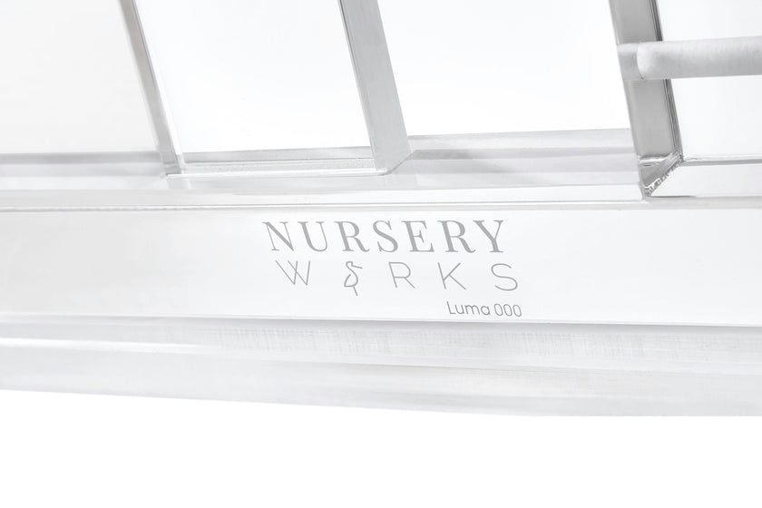 Nursery Works Luma Crib in Acrylic and Rose Gold