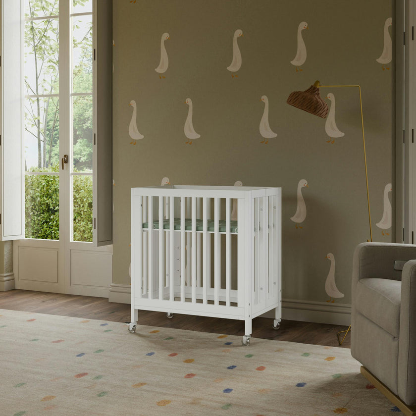 Rolli 9-in-1 Convertible All-Stages® Crib with Bassinet & Toddler Bed Conversion Kits in White