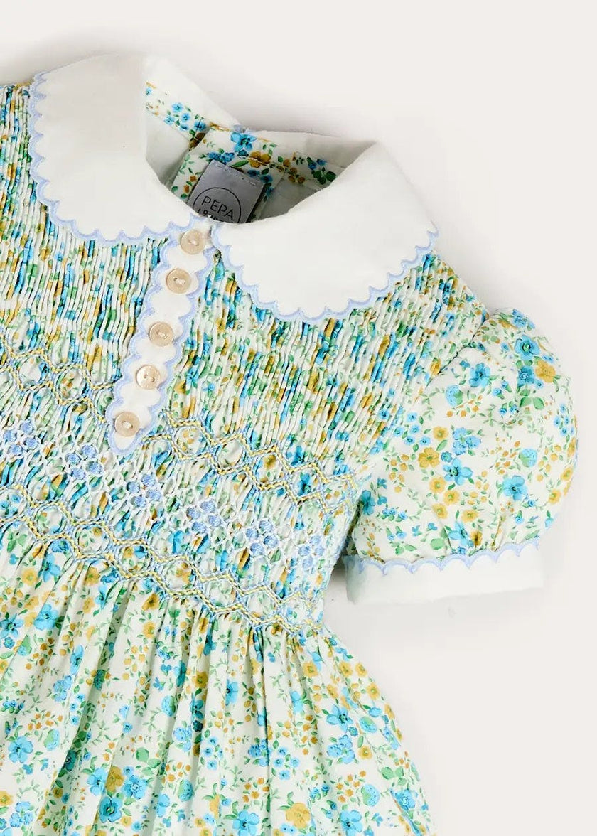 Louisa Floral Hand Smocked Short Sleeve Dress in Blue (18mths- 10yrs)