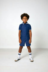 navy polka dot polo shirt