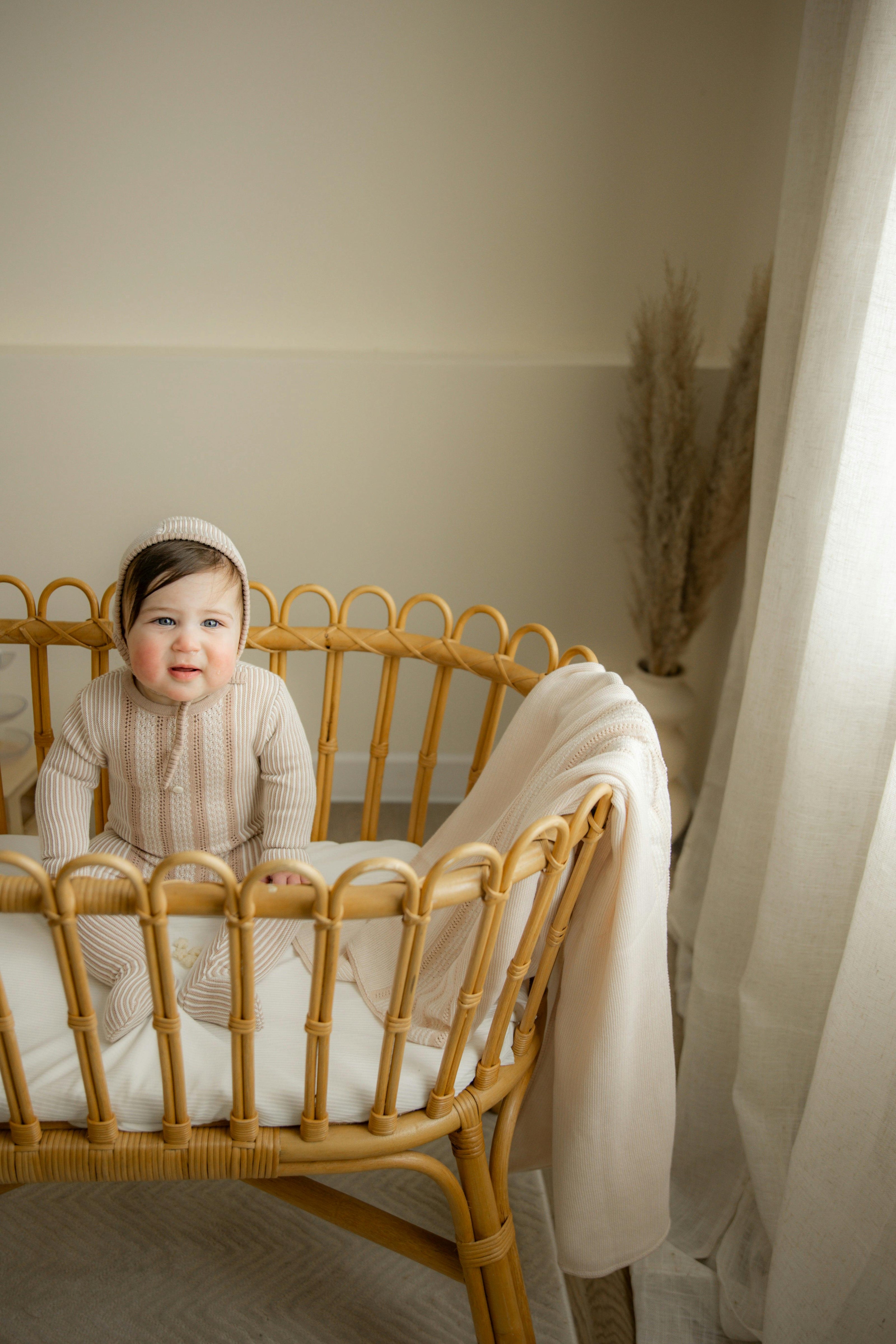Striped Pointel knit Onesie